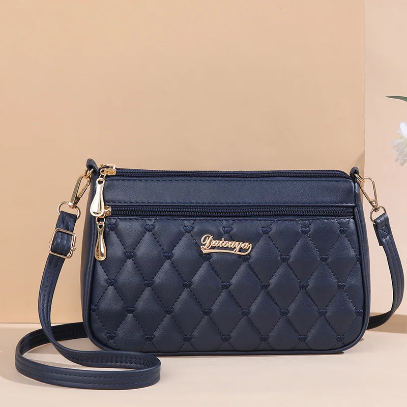 Women’s Embroidery Messenger Bag | Leather Handbag with Hair Ball