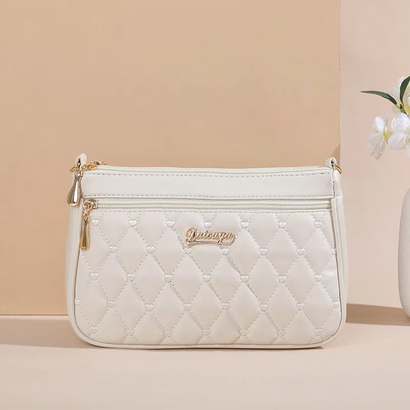 Women’s Embroidery Messenger Bag | Leather Handbag with Hair Ball